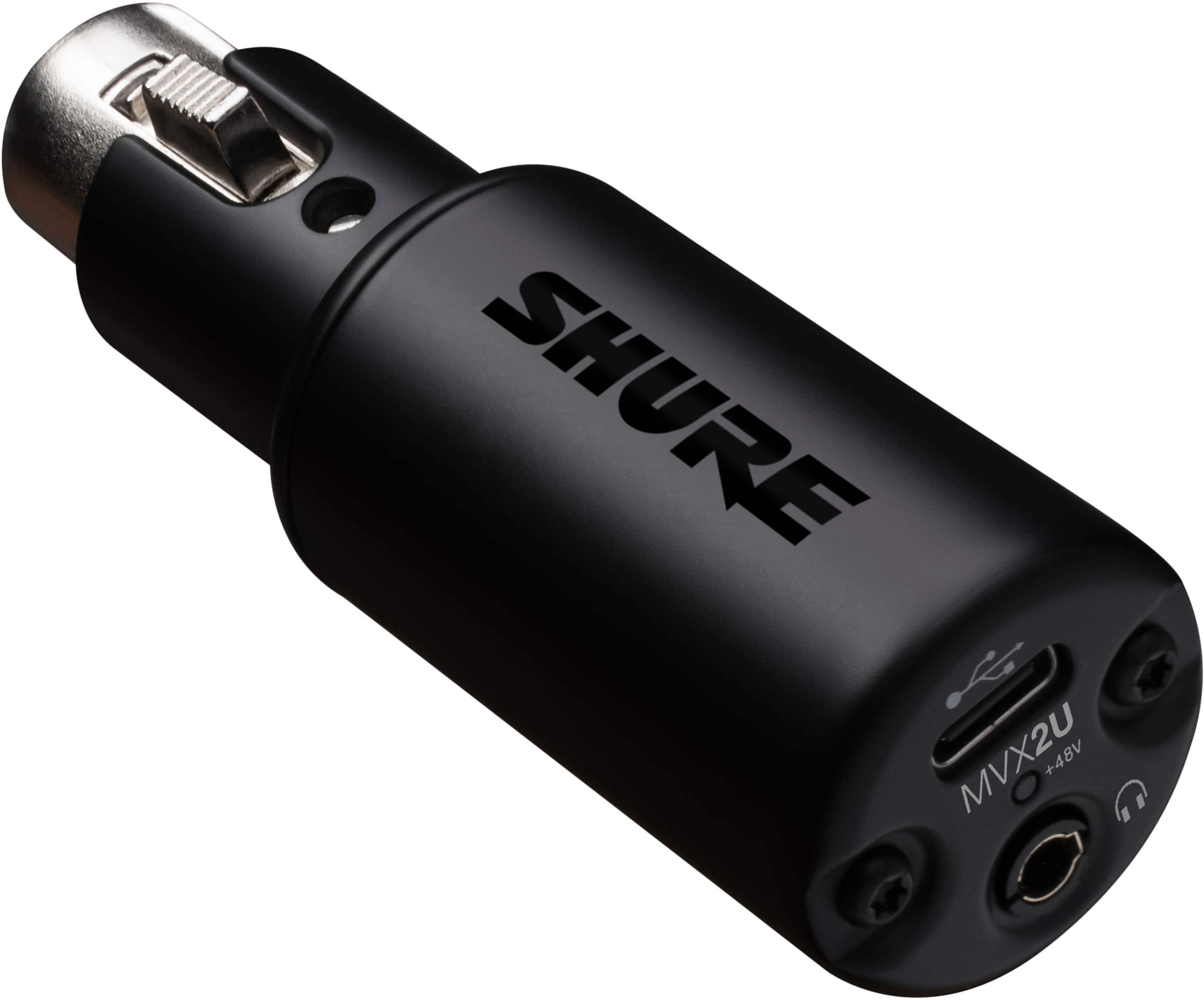 Installing Shure MVX2U Audio Interface XLR to USB Mic Activator on a wooden desk